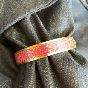 Coach logo, pink and gold logo bracelet